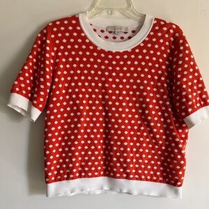 Loft brand short sleeve sweater in orange and white polka dots.